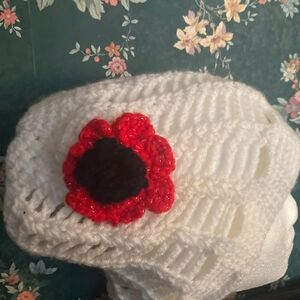 Elegant White Handknit Hat with Red Floral Accent